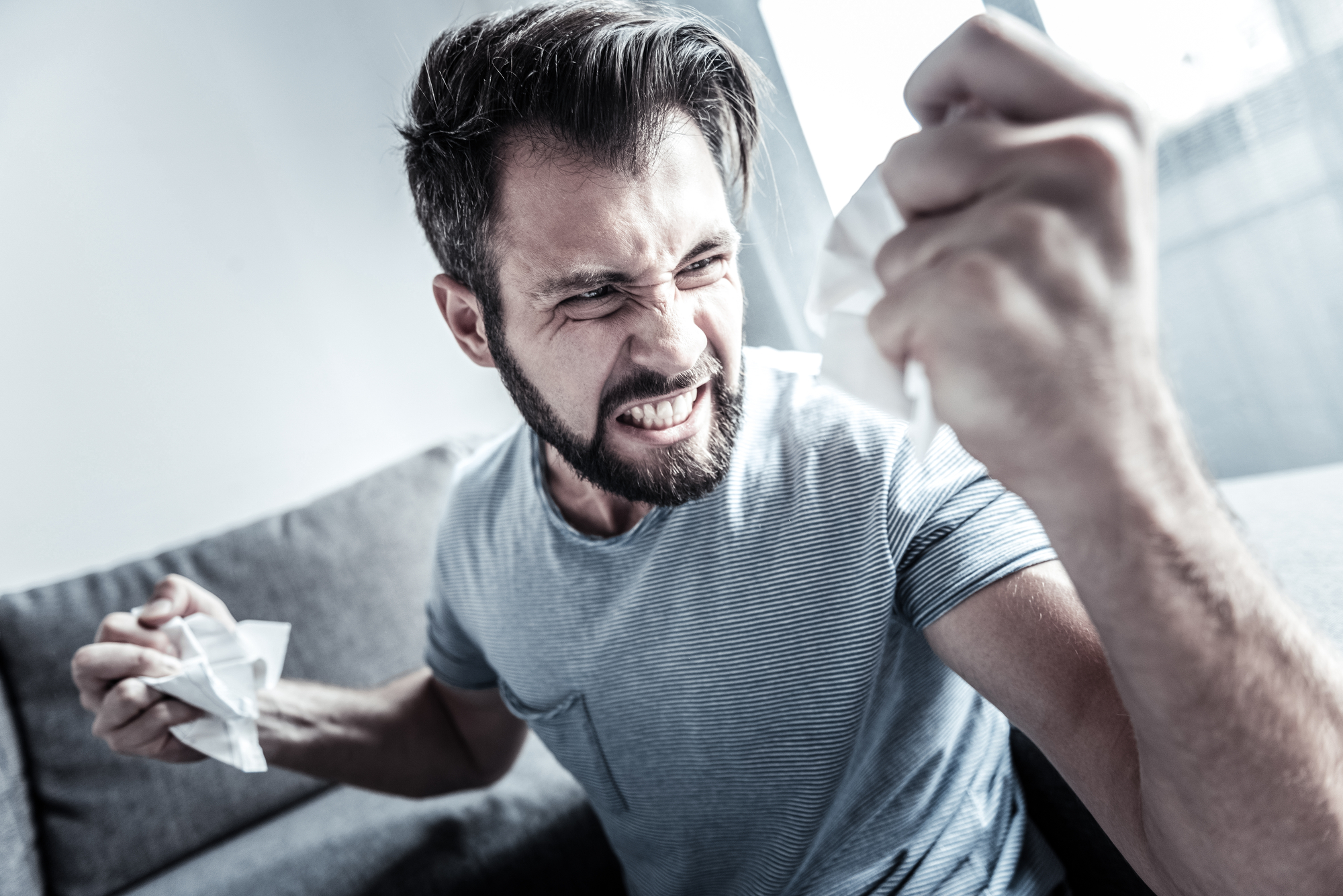 Angry bearded man demonstrating his emotions